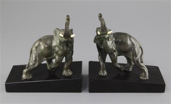 L. Carvin. A pair of Art Deco bronze bookends, modelled as elephants, 6.5in.